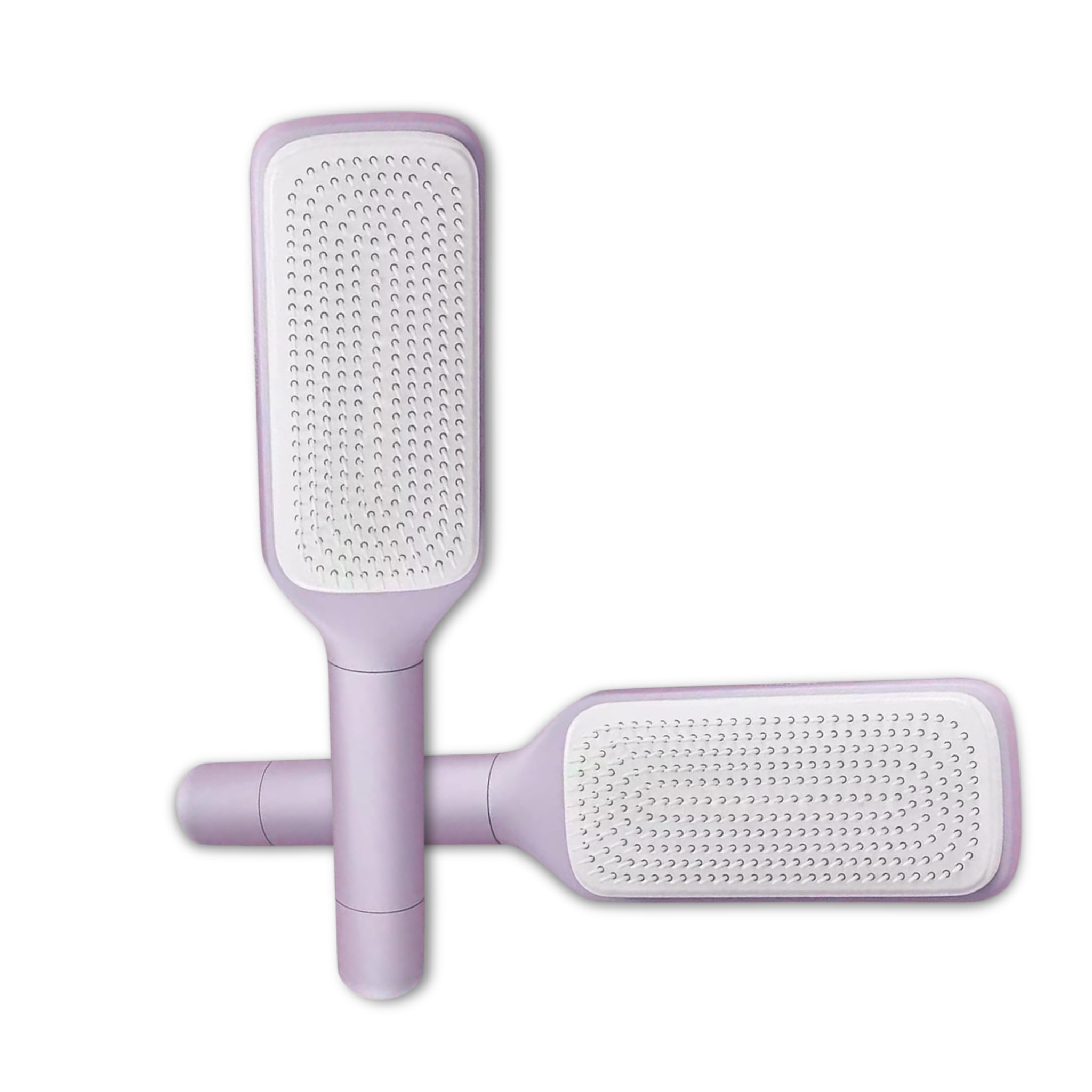 Two purple pet grooming brushes with textured surfaces on a white background