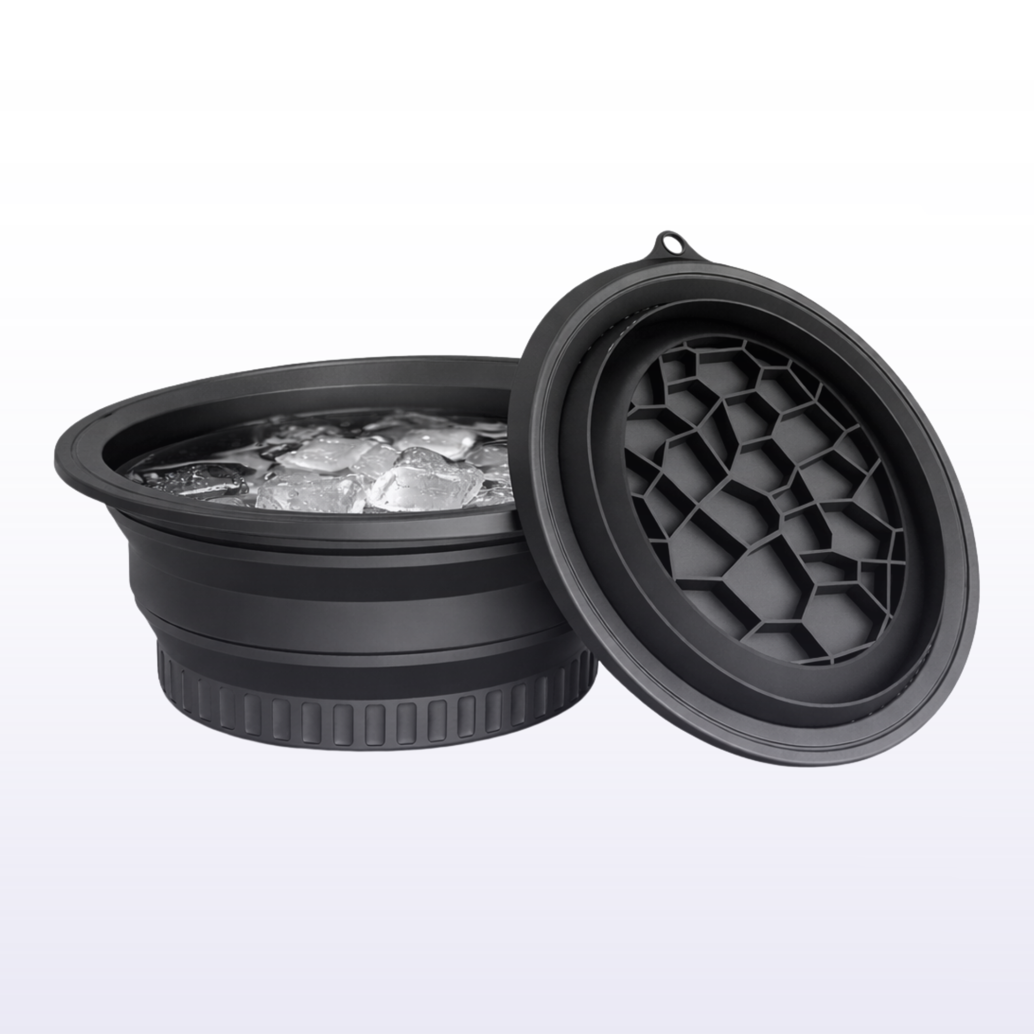 Black collapsible ice bucket with textured lid on a white background